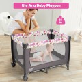Image of Costway 4-in-1 Convertible Portable Baby Playard Newborn Napper with Music and Toys