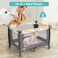 Costway 4-in-1 Convertible Portable Baby Playard Newborn Napper with Music and Toys